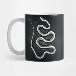 The sinuousness of the snake with its exposed skeleton Mug